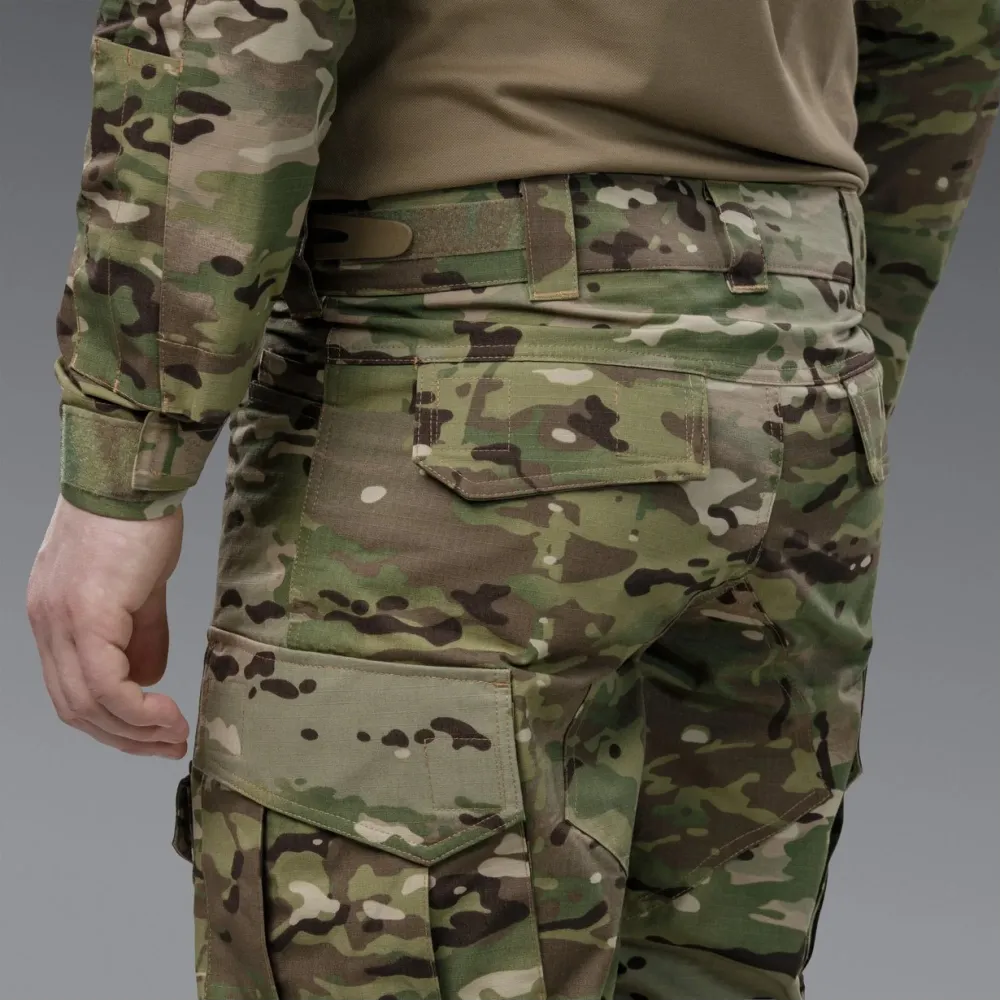 Комплект форми: убакс BattleSkin Regular та тактині штани Battlegear з наколіниками. Колір Мультикам
