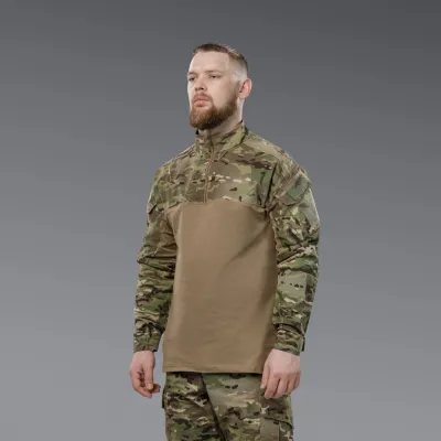 Комплект форми: убакс BattleSkin Regular та тактині штани Battlegear з наколіниками. Колір Мультикам