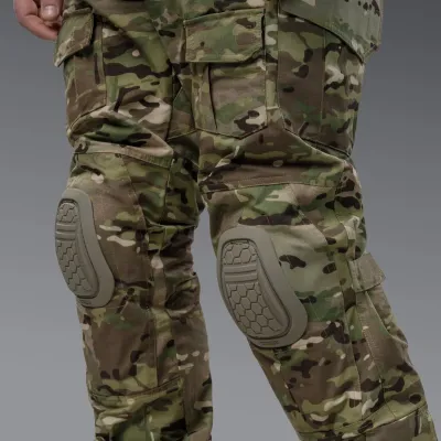 Комплект форми: убакс BattleSkin Regular та тактині штани Battlegear з наколіниками. Колір Мультикам
