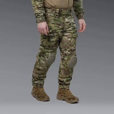Комплект форми: убакс BattleSkin Regular та тактині штани Battlegear з наколіниками. Колір Мультикам