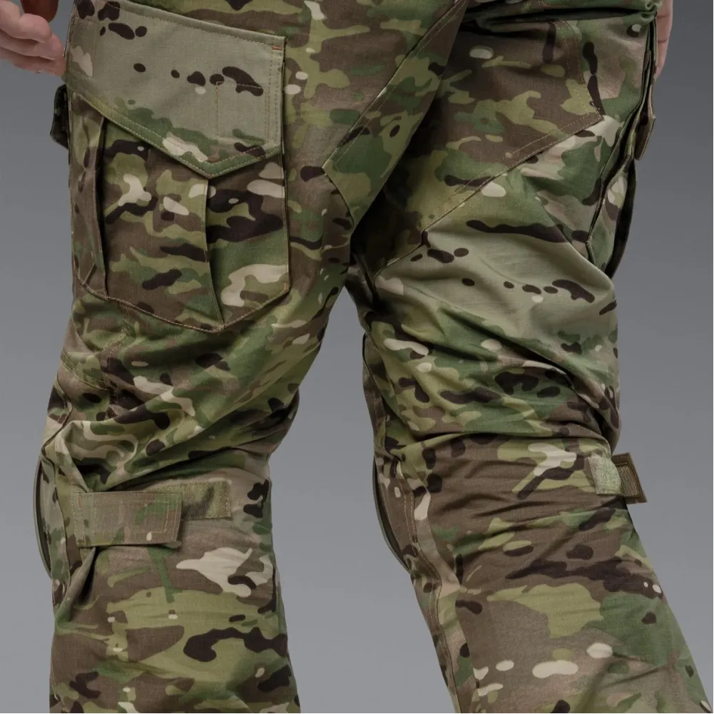 Комплект форми: убакс BattleSkin Regular та тактині штани Battlegear з наколіниками. Колір Мультикам