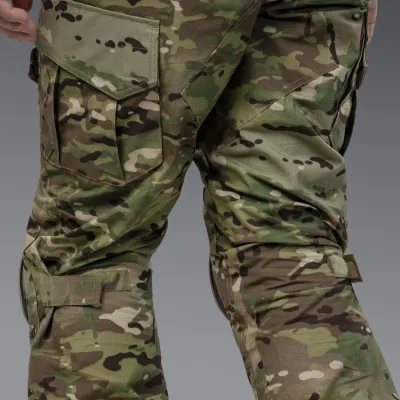 Комплект форми: убакс BattleSkin Regular та тактині штани Battlegear з наколіниками. Колір Мультикам
